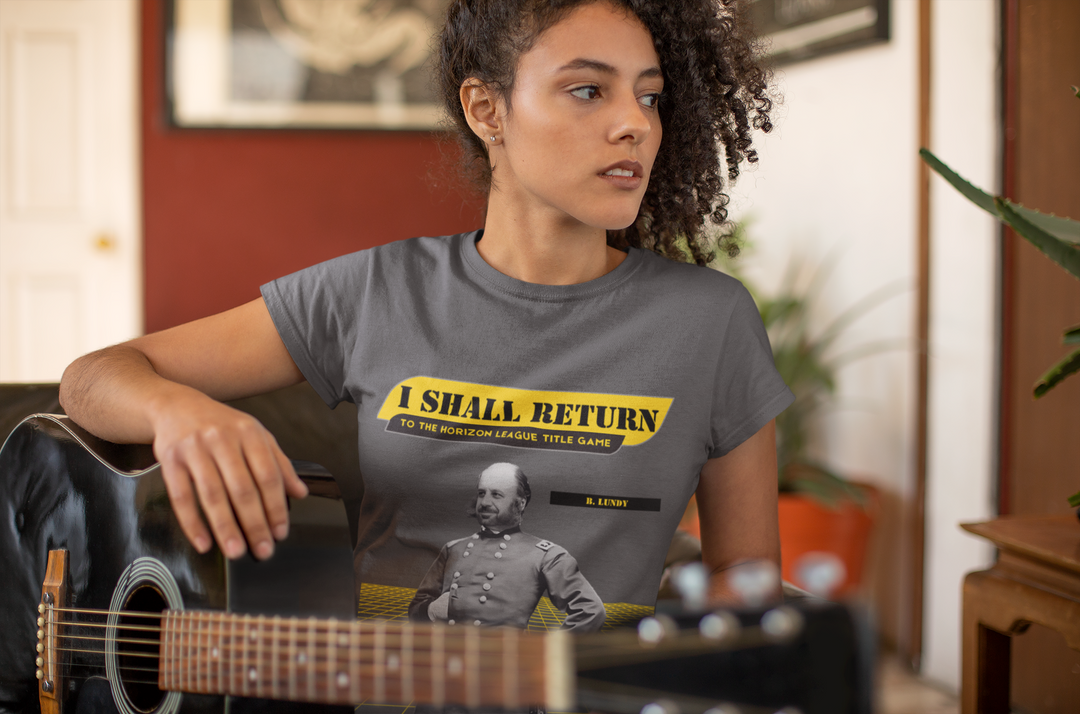 The Coach Lundy "I Shall Return" Short Sleeve Tee